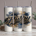 Three white tumblers with a navy and gold abstract watercolor design and the word "Hubby".