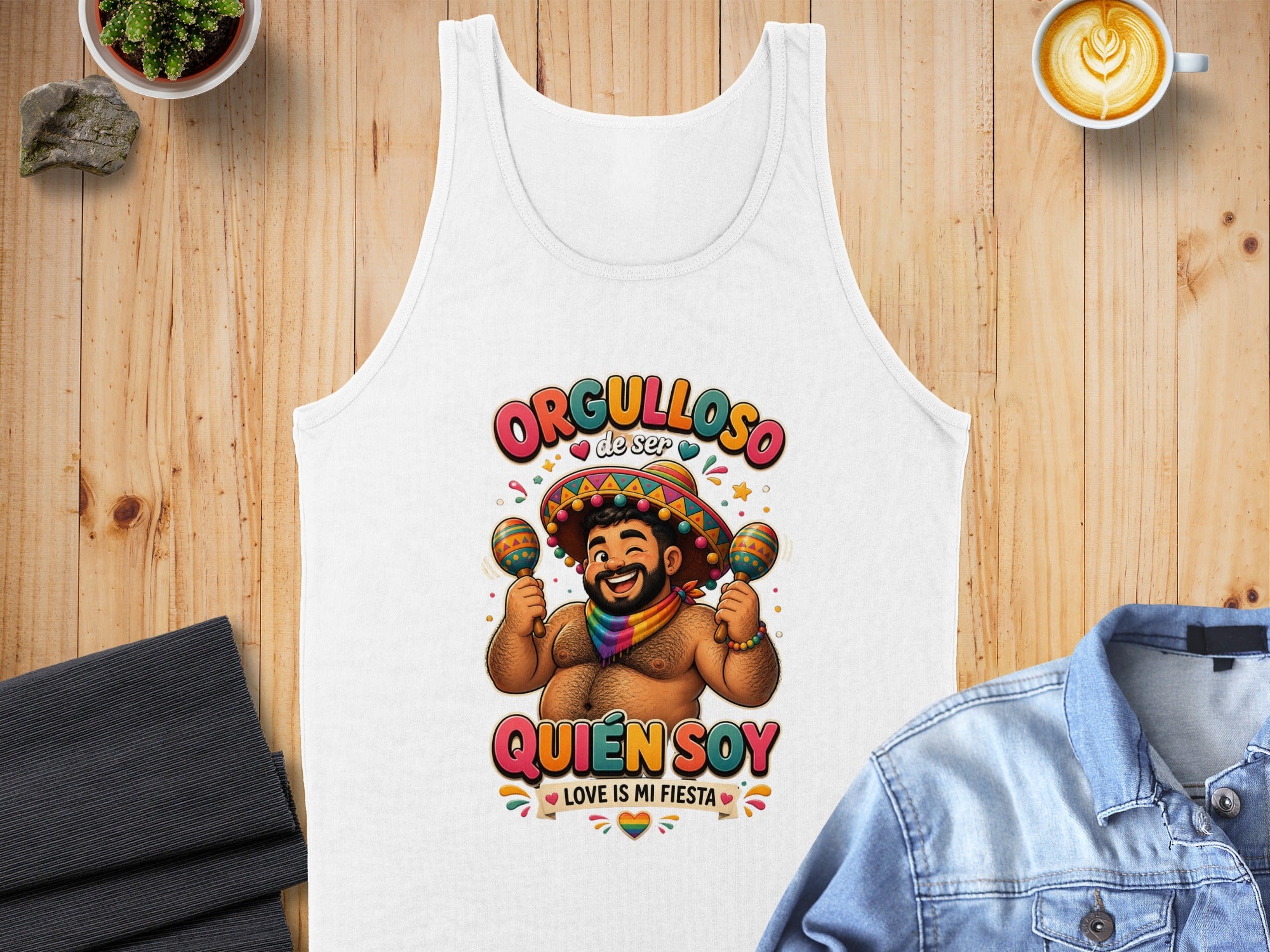 Tank top with "Orgulloso de ser quien soy" text and colorful celebration graphic.