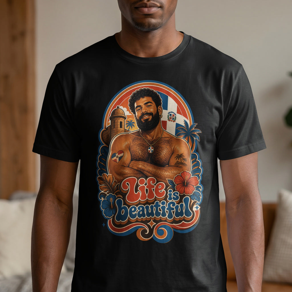 Man with crossed arms wearing a t-shirt with "Life is beautiful" text.