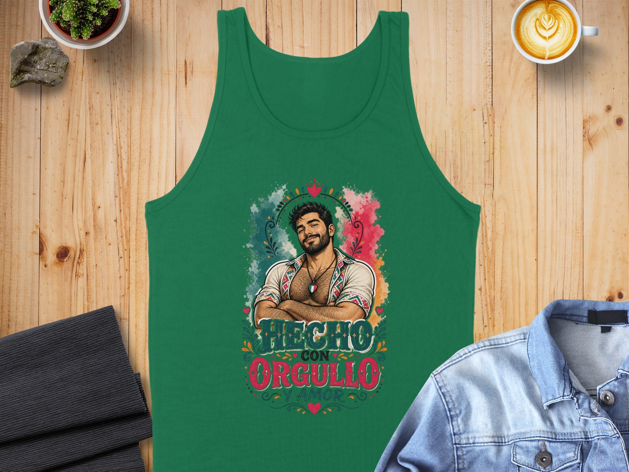 Green tank top with colorful graphic that says "Hecho con Orgullo".