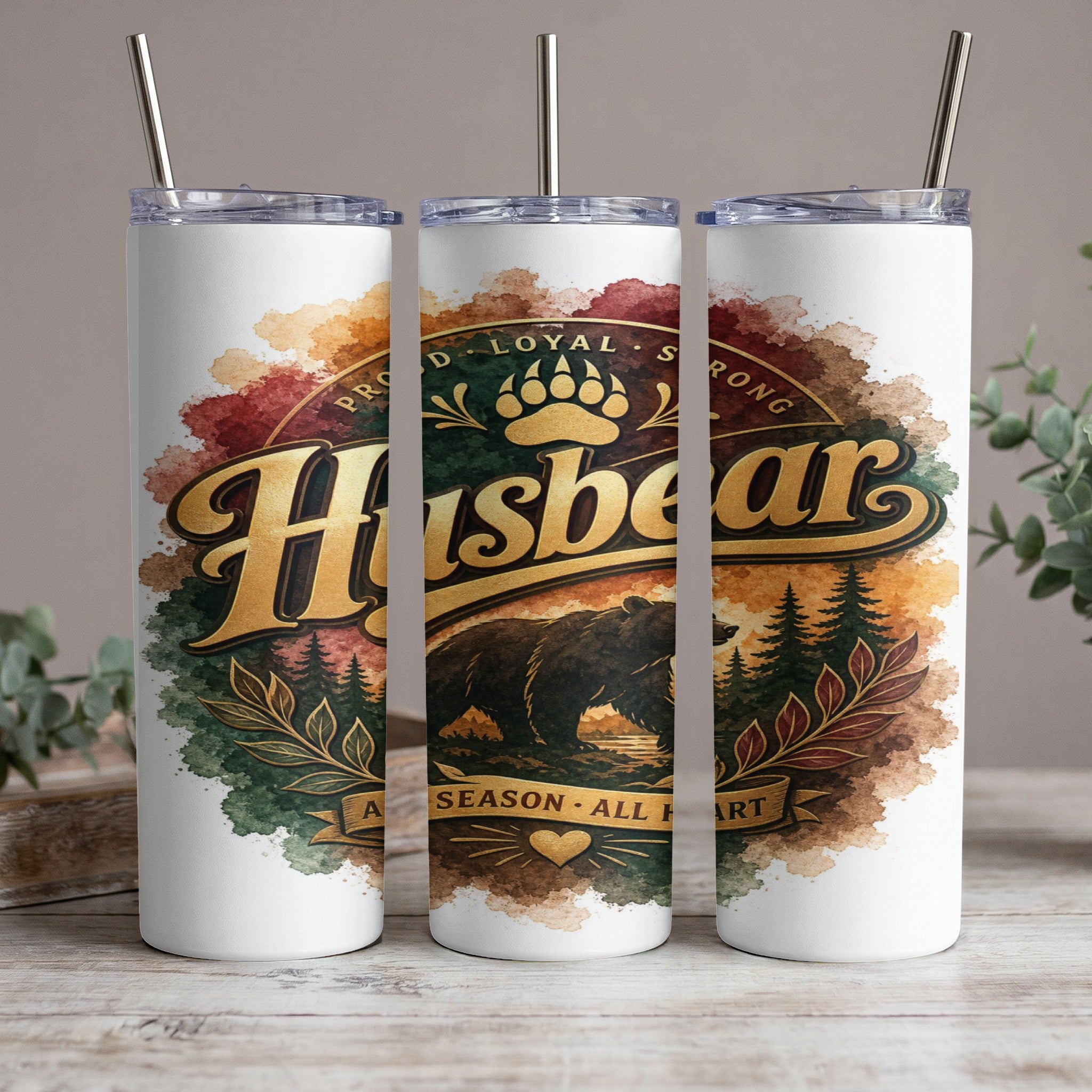Tumbler with "Husbear" design featuring a bear, trees, and paw print emblem.