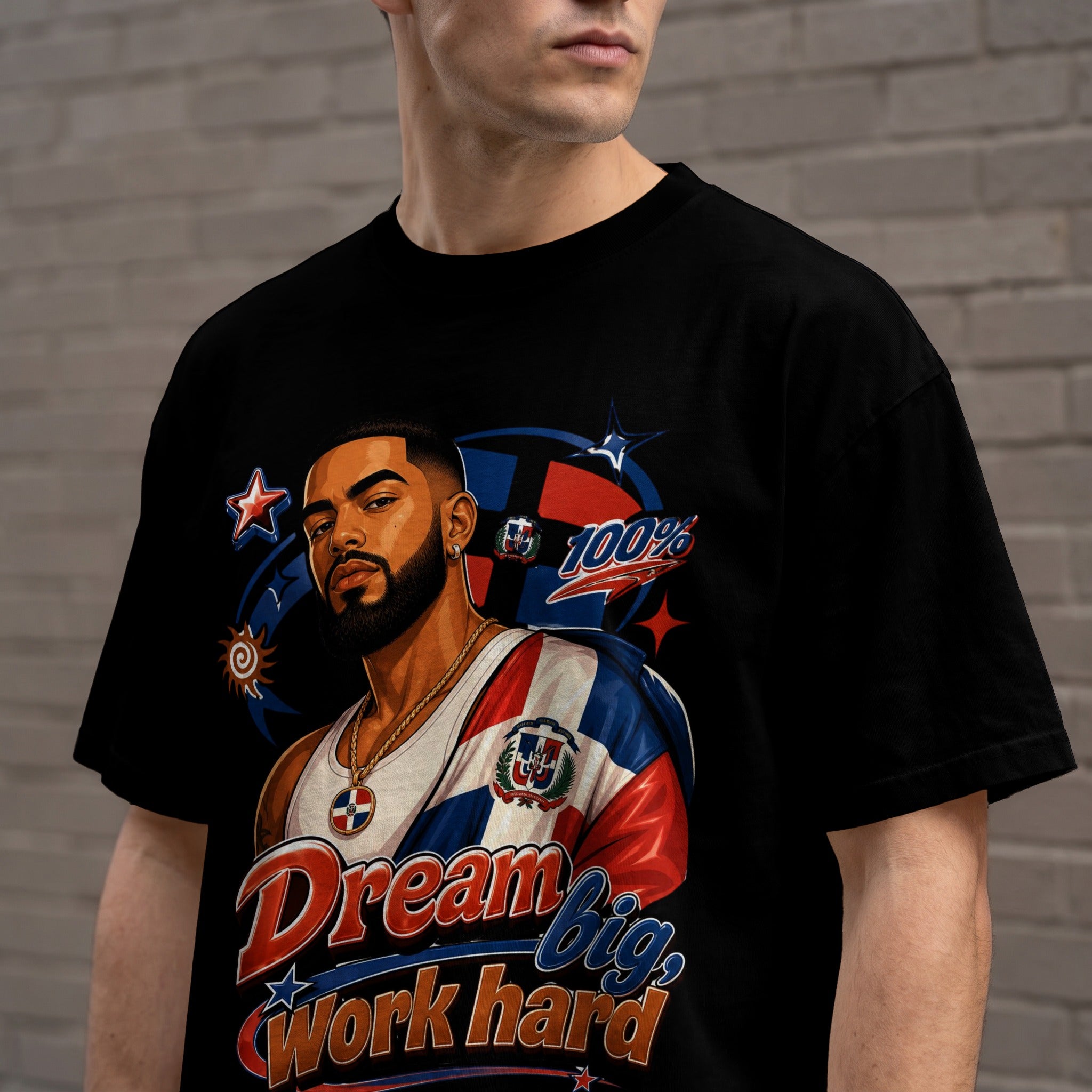 Man wearing a black t-shirt with a Dominican Republic flag and "Dream Big, Work Hard" text.