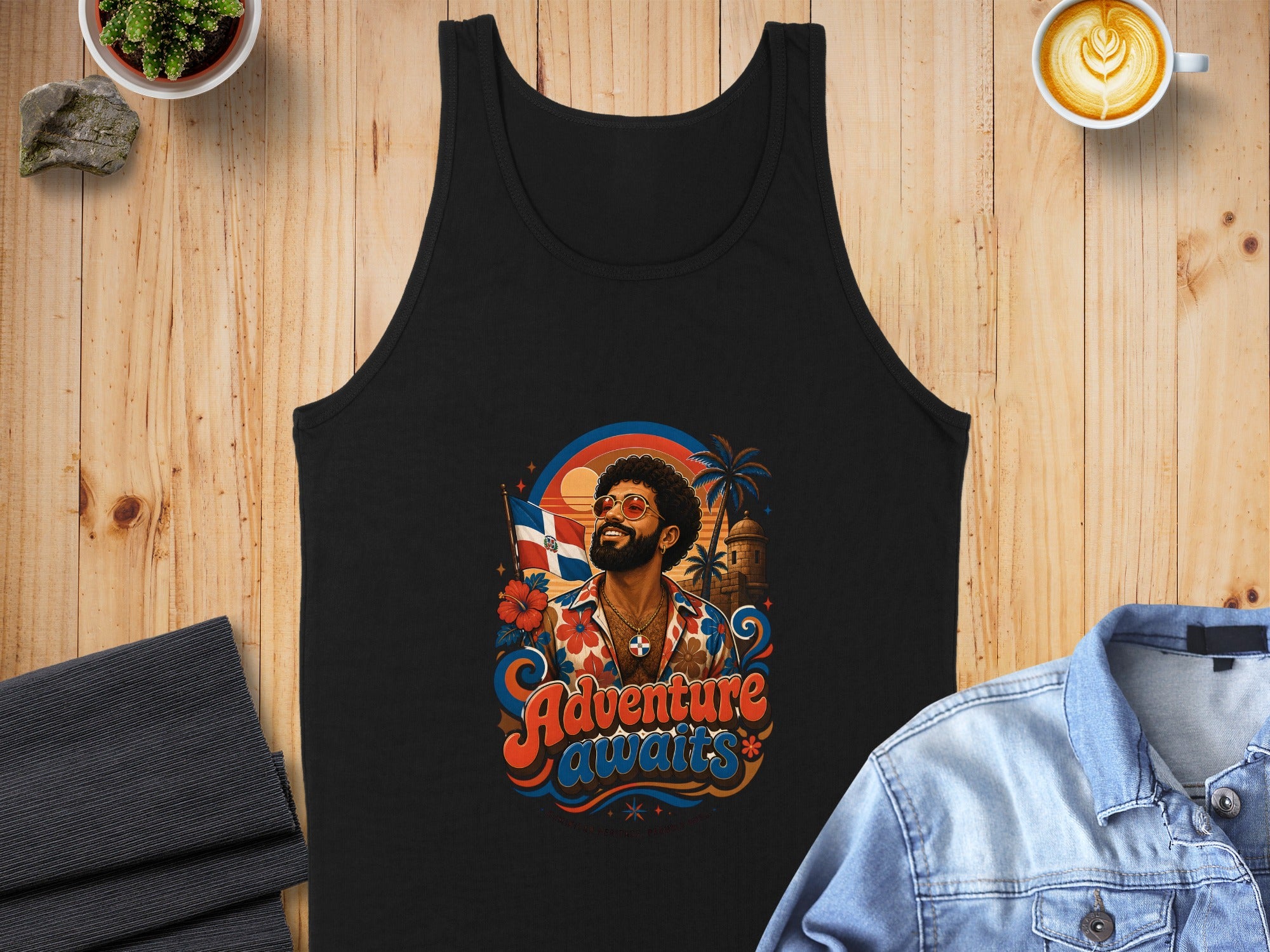 Black tank top with colorful "Adventure Awaits" graphic featuring a person waving a Dominican Republic flag.