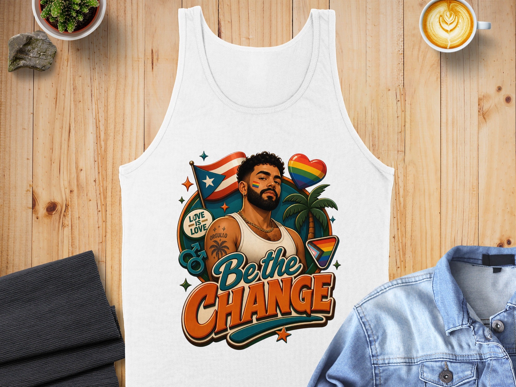 White tank top with rainbow flag, man, palm tree, and "Be the Change" text.