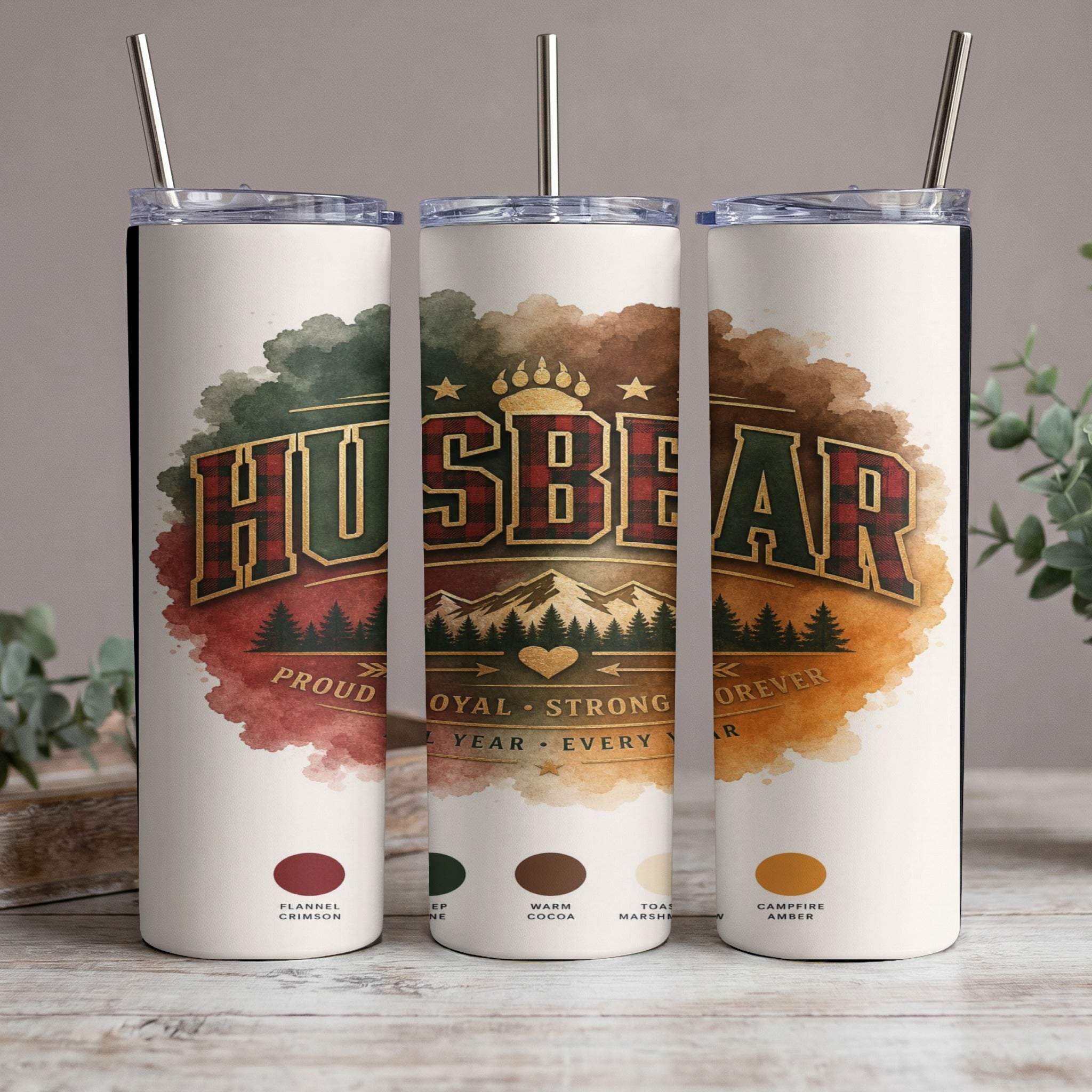 Three tumblers with "HUSBEAR" design, featuring mountains and plaid accents.