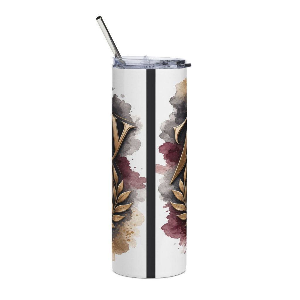 White tumbler with ornate gold letter design and watercolor splatters.