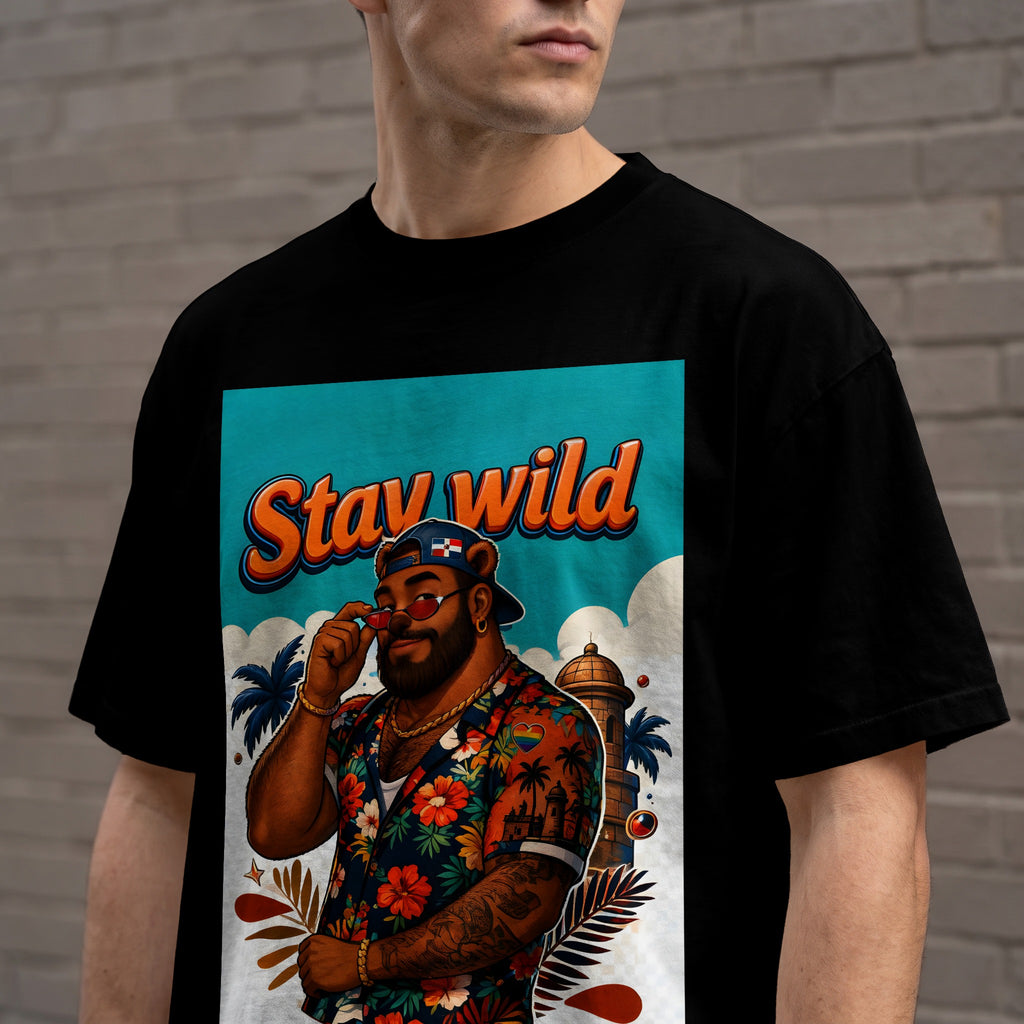 Man wearing black t-shirt with "Stay Wild" and tropical graphic.