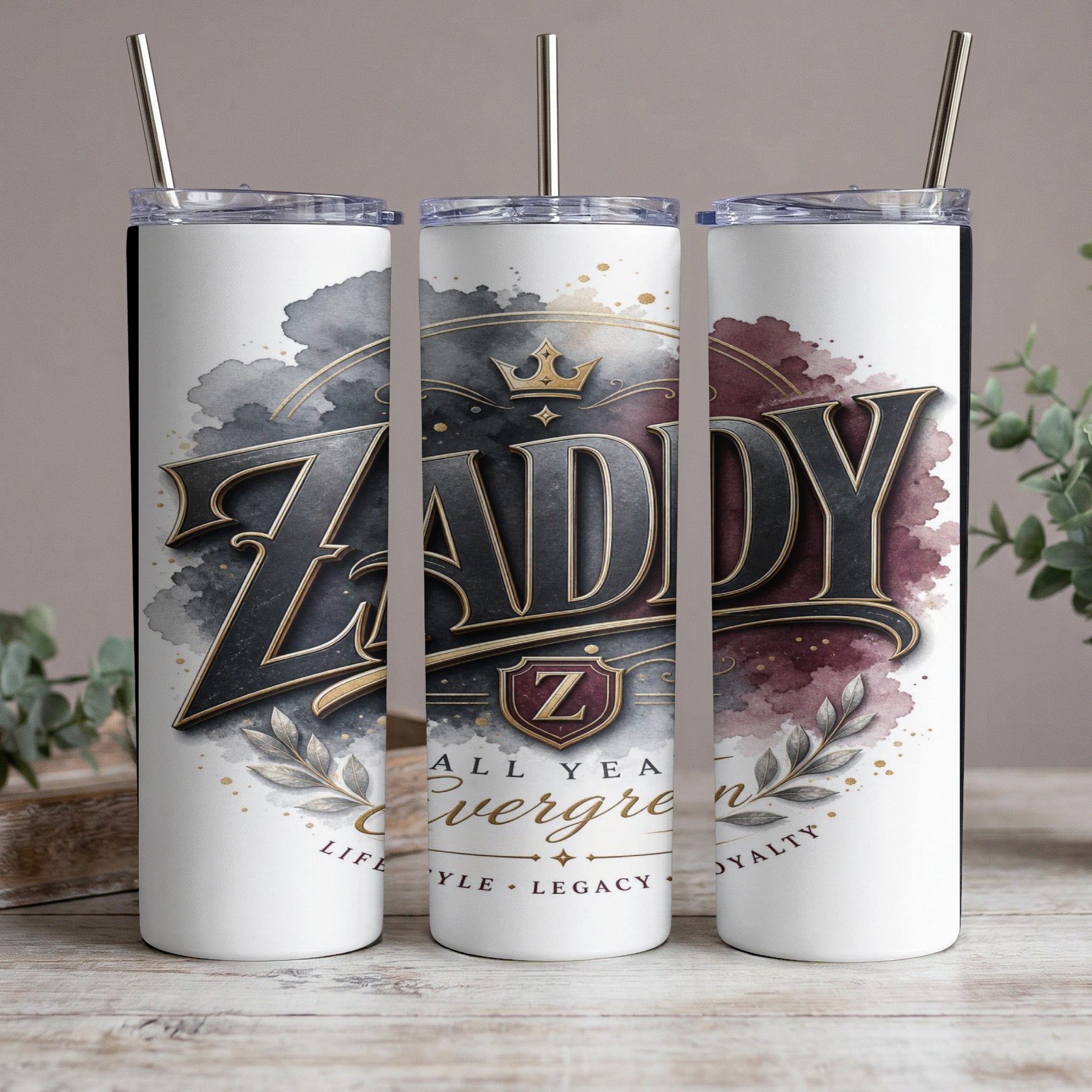 Tumblers with "Zaddy Evergreen Style Legacy Loyalty" text and crown graphic.