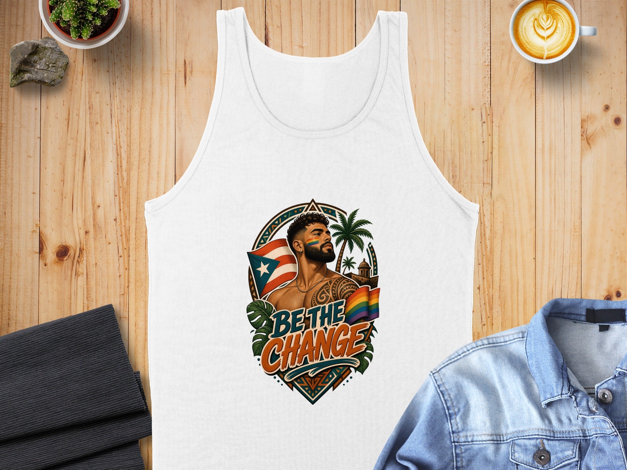 White tank top with "Be the Change" text, Puerto Rican flag, and rainbow pride flag design.