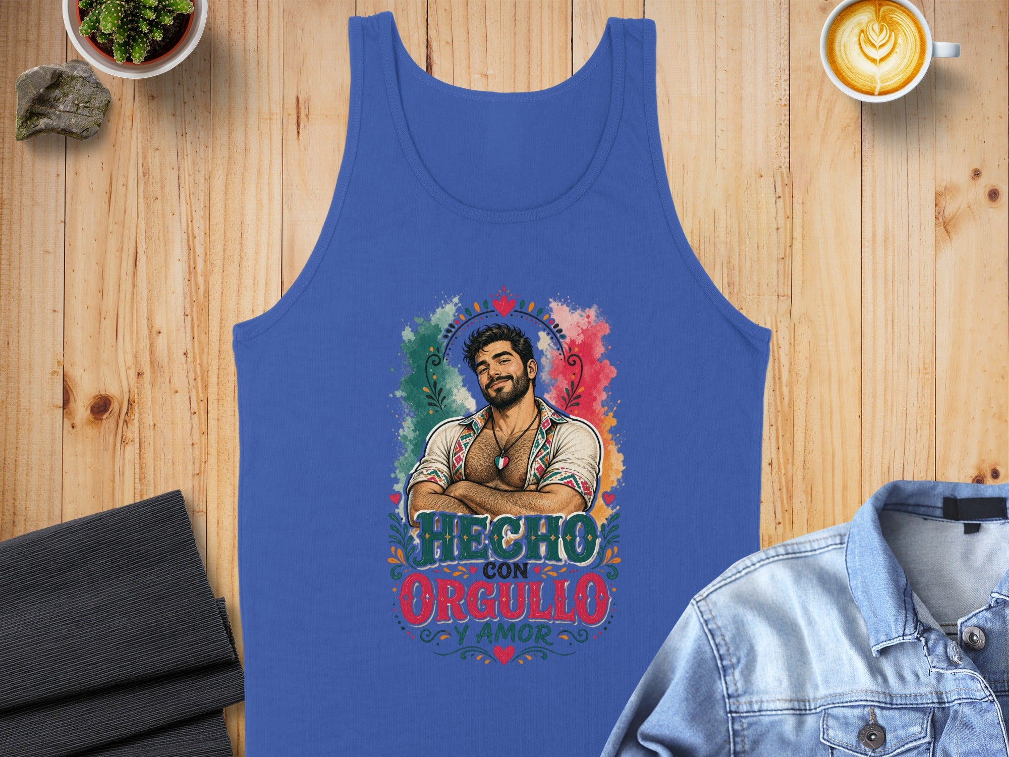 Blue tank top with "Hecho con Orgullo y Amor" text and man's portrait.