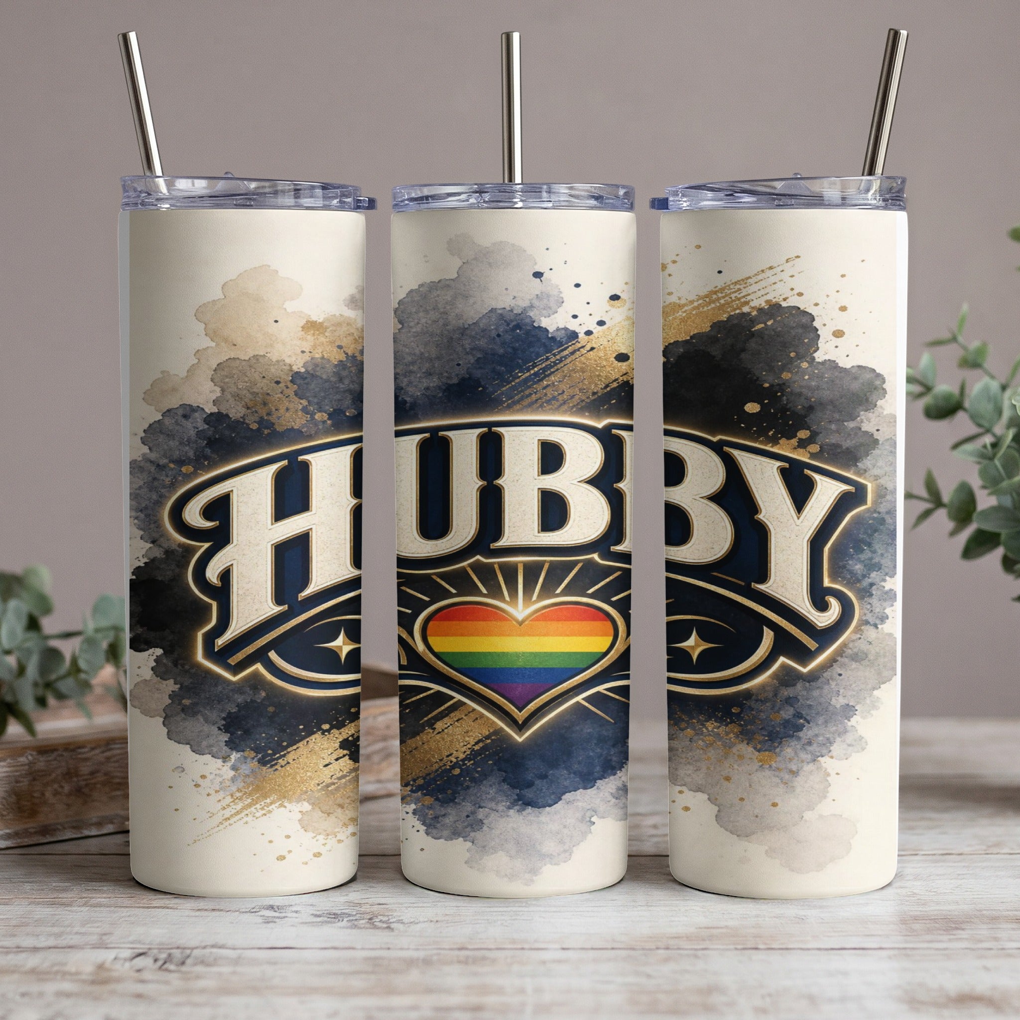Tumbler with "Hubby" text, rainbow heart, and abstract design.