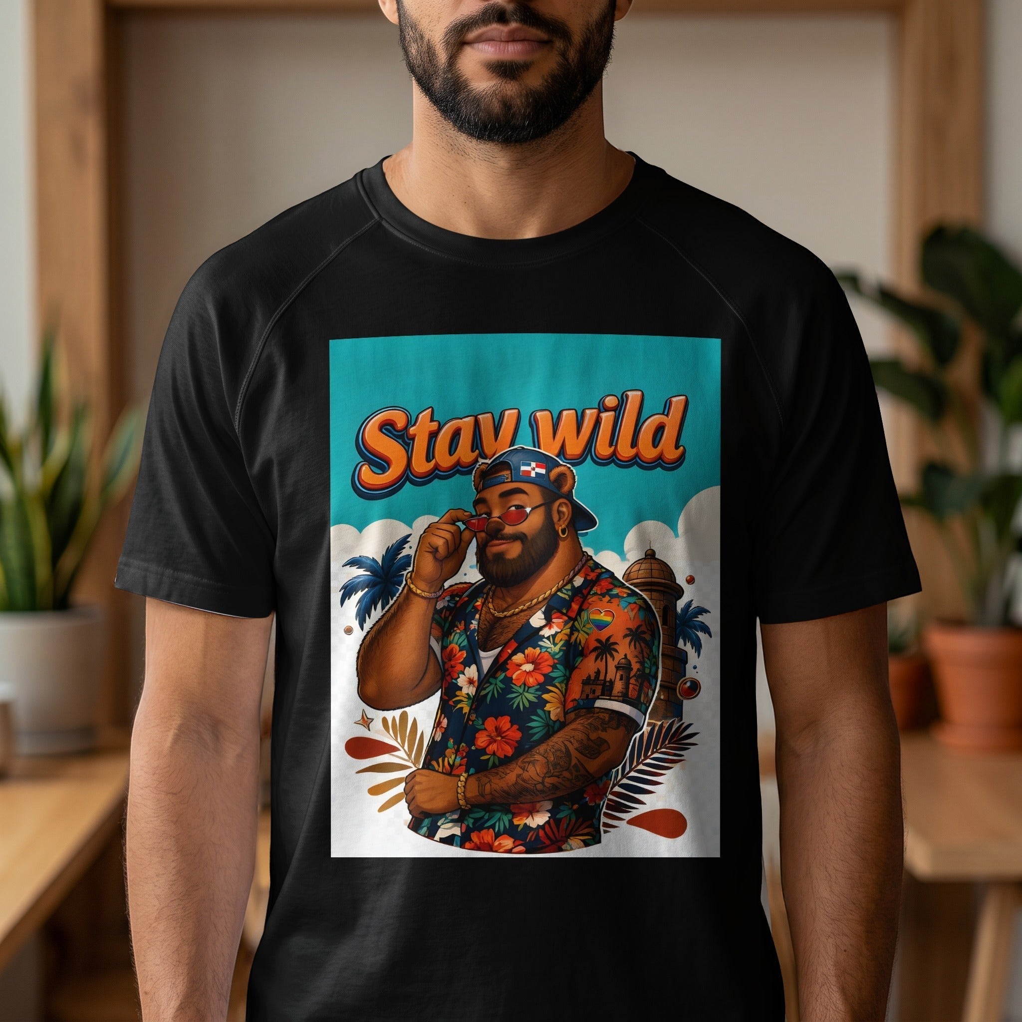 Man in black t-shirt wearing a Hawaiian shirt with "Stay Wild" text design.