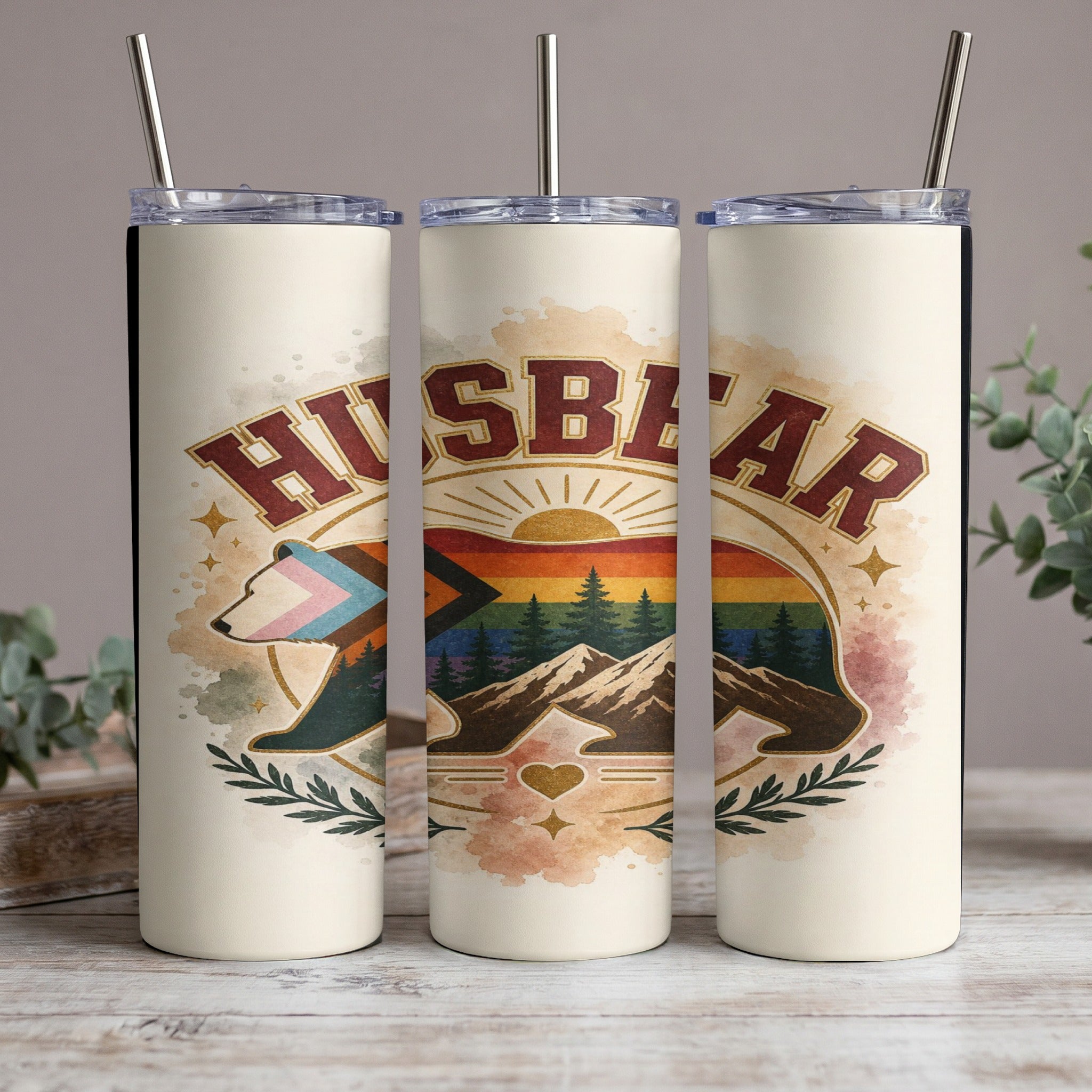 Tumbler with "Husbear" text, a bear, rainbow, and mountains design.