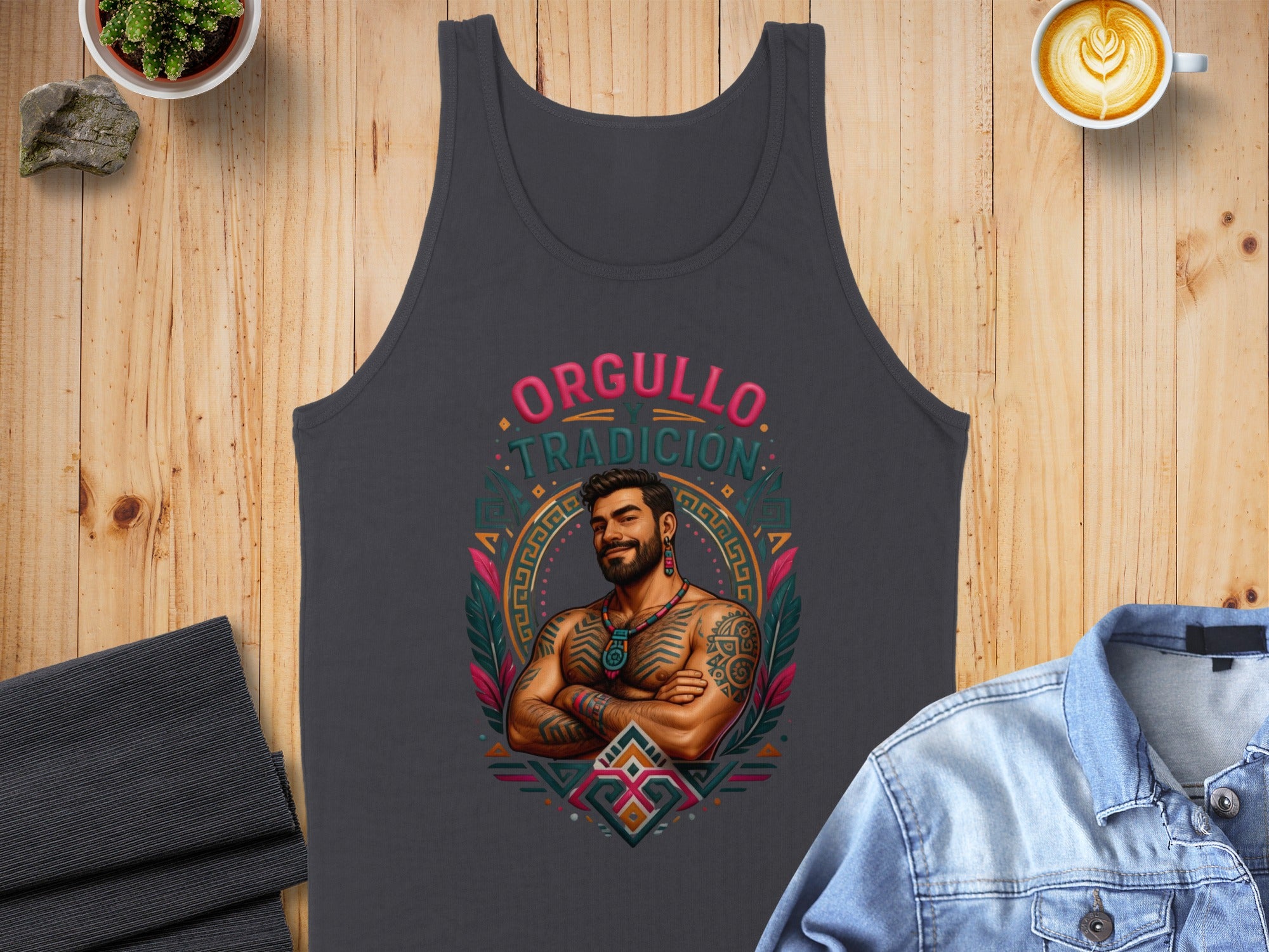 Dark gray tank top with colorful geometric design featuring a man with tattoos and text "ORGULLO TRADICION".