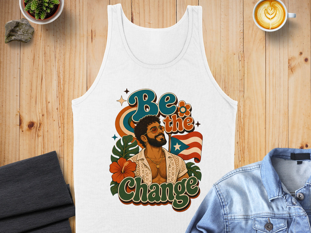 White tank top with "Be the Change" text and a smiling man.