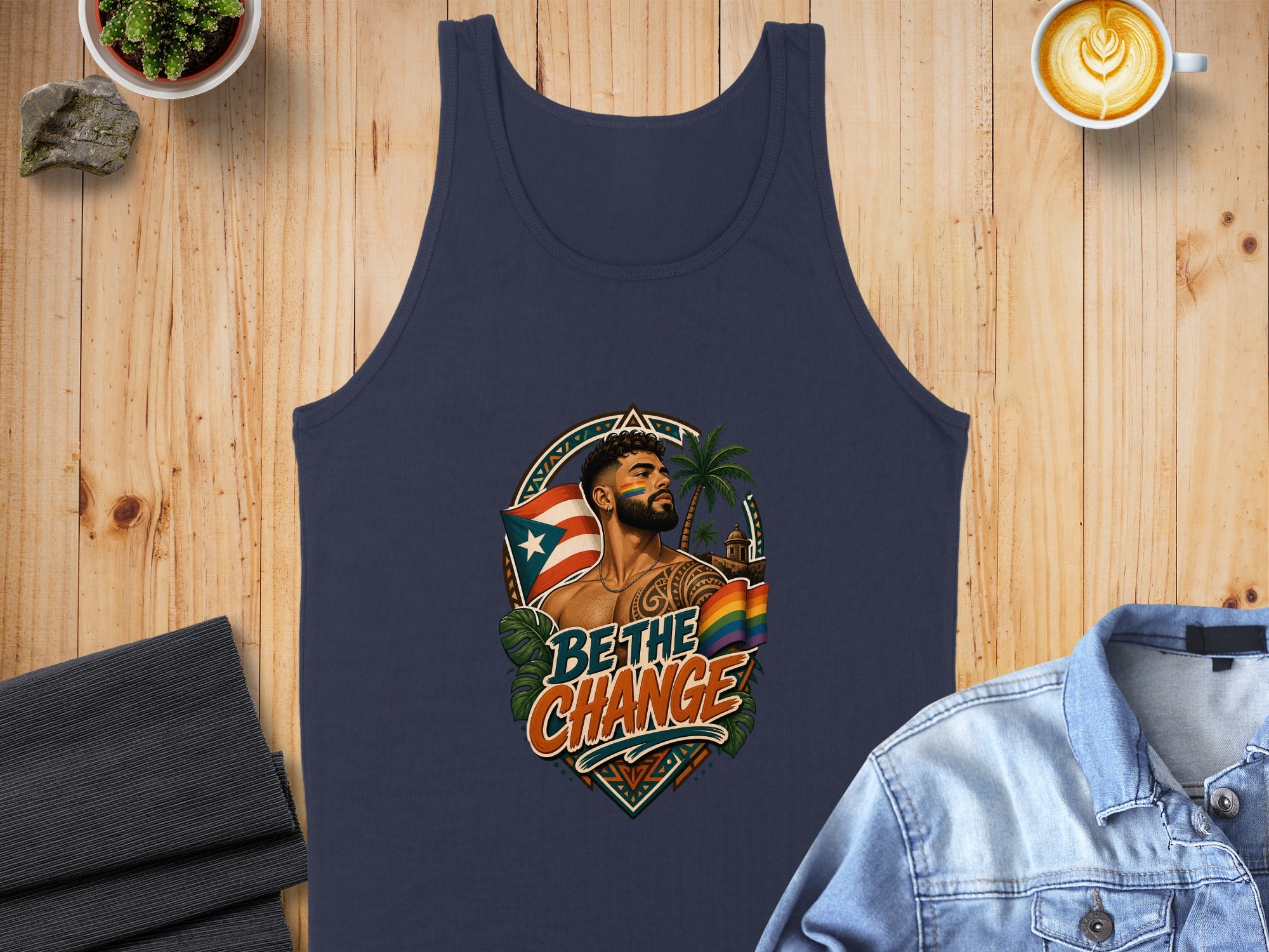 Navy tank top with "Be the Change" text and Puerto Rican and rainbow flags.