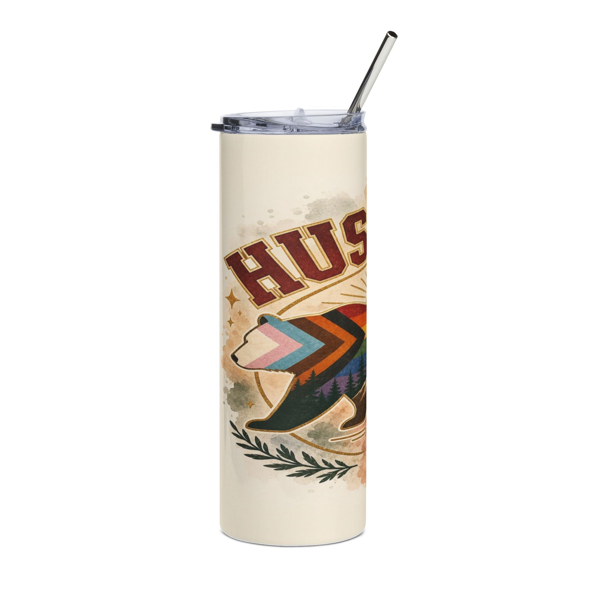 Cream tumbler with "HUS" text and a bear wearing a striped patterned cape.