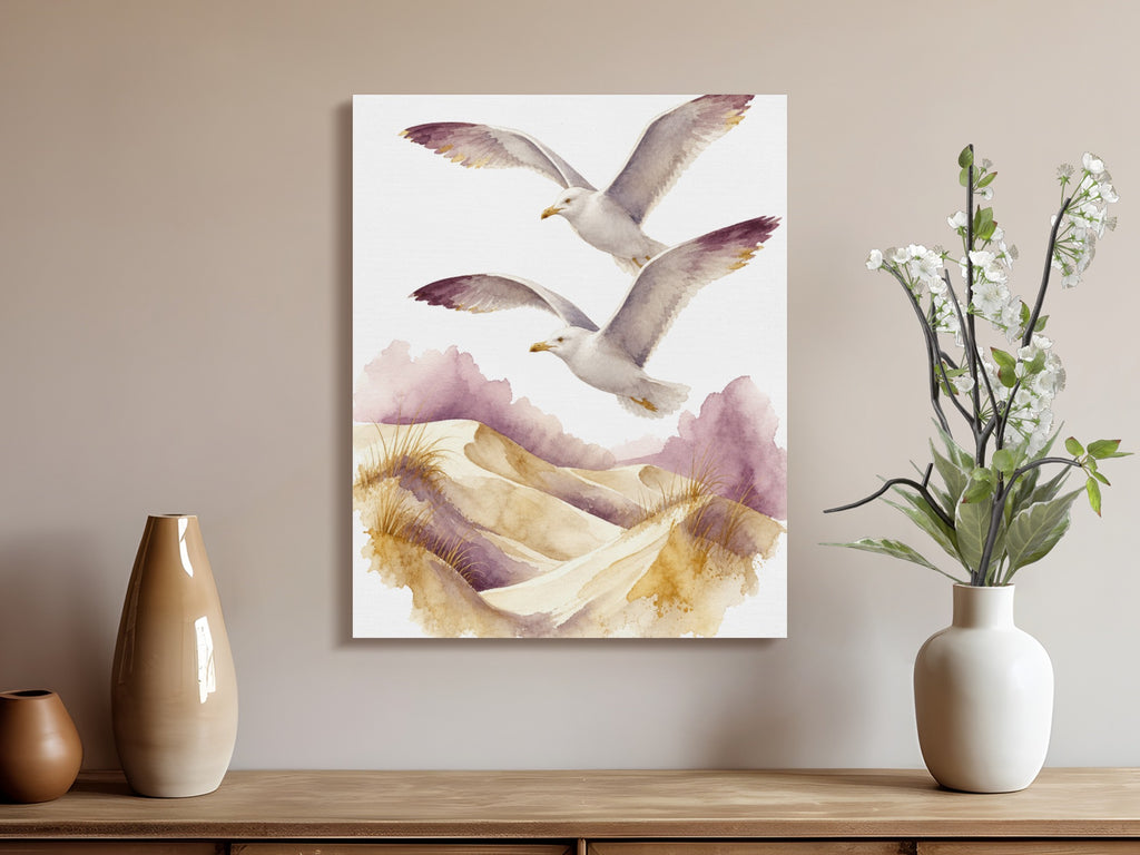 Watercolor painting of two seagulls flying over sand dunes with purple accents.