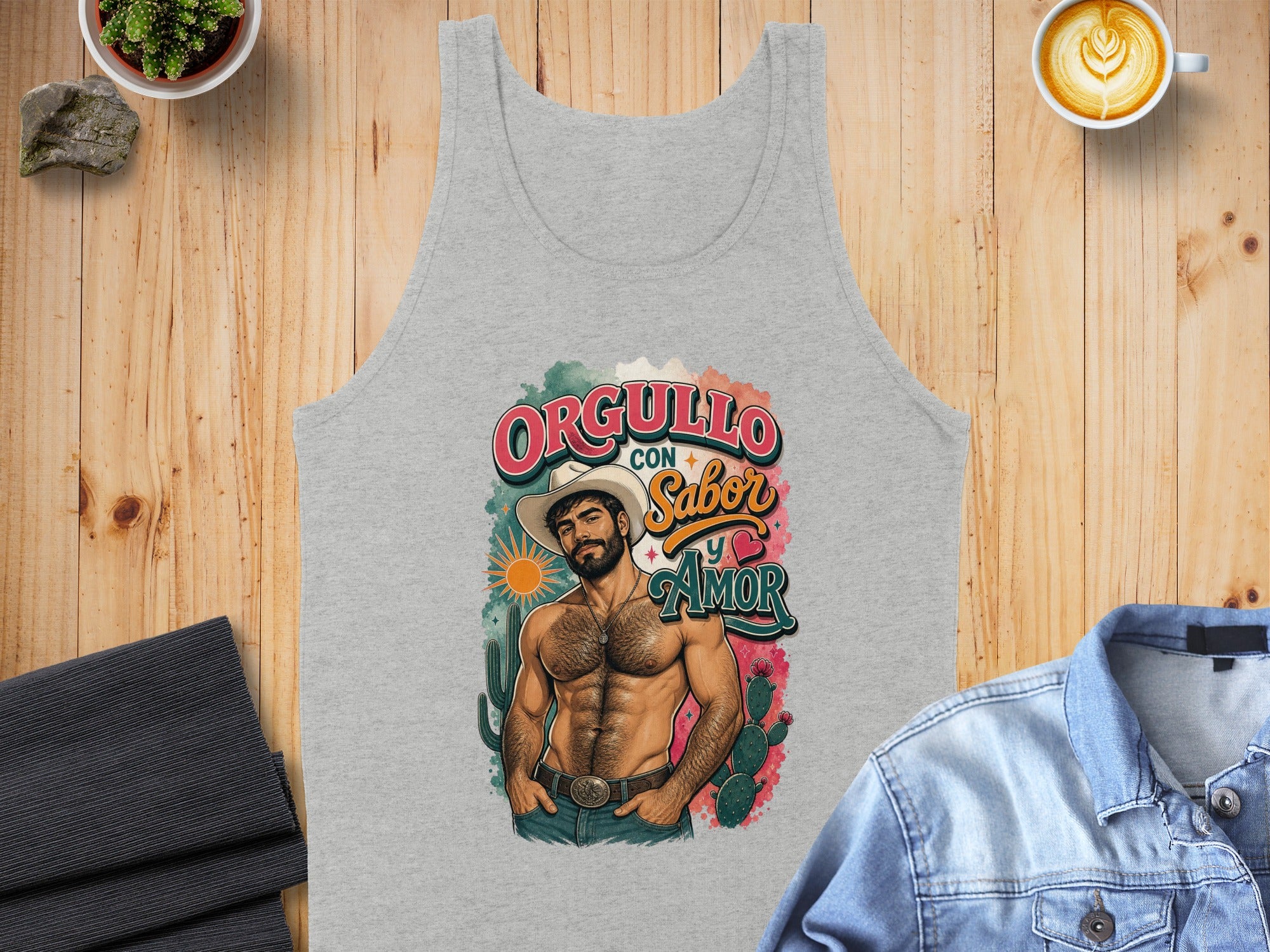 Grey tank top with illustration of man, cacti, and "Orgullo con Sabor y Amor" text.
