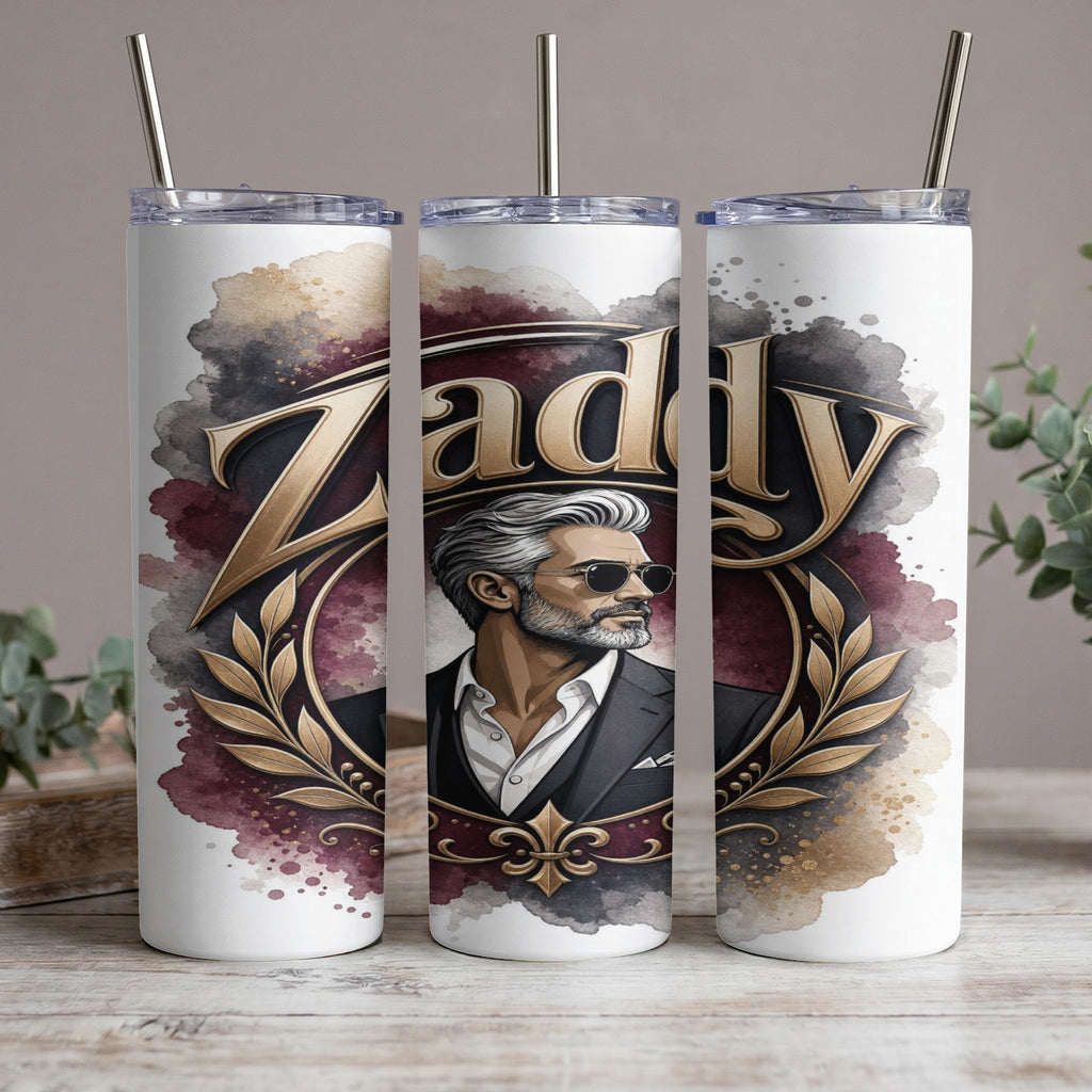 White tumbler with "Zaddy" text, a distinguished man in sunglasses, and ornate gold leaf details.