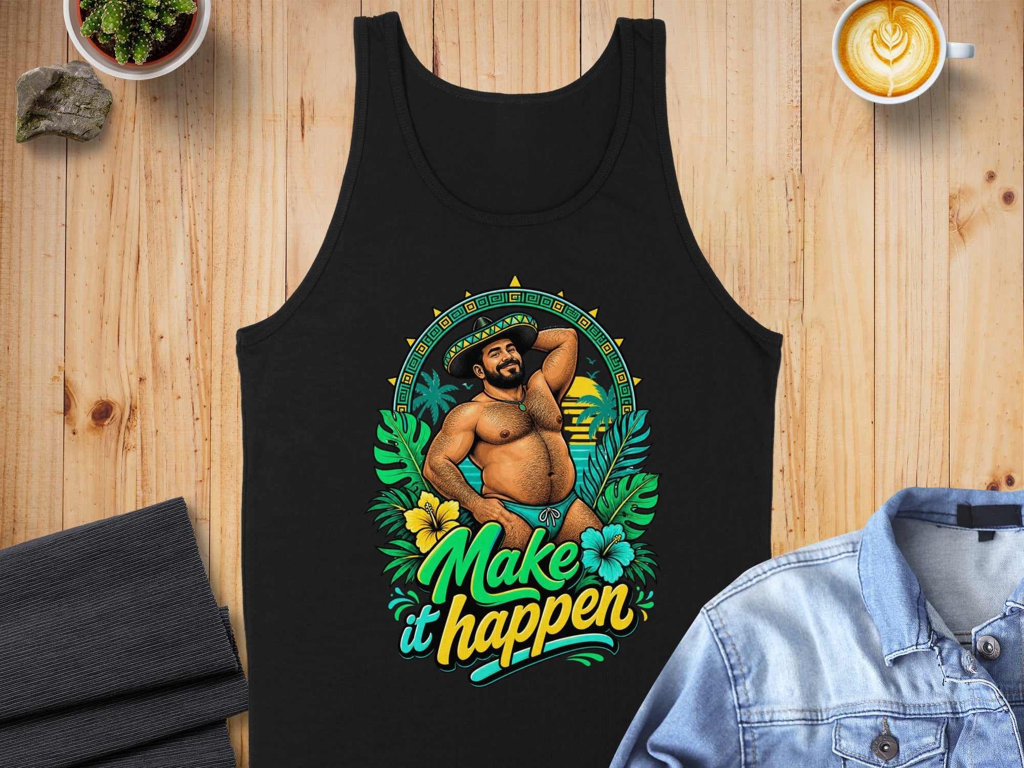 Black tank top with a man in a sombrero, "Make it happen" text, and tropical foliage.
