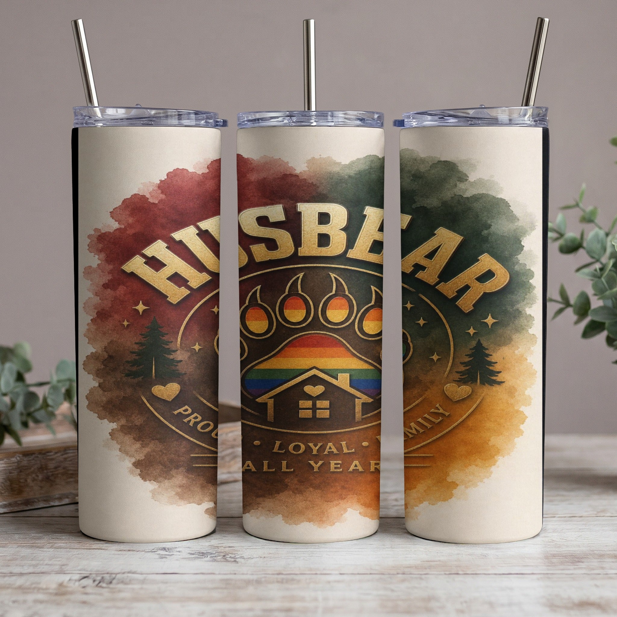 Tumbler with "Husbear" text, paw print, rainbow, and house design.