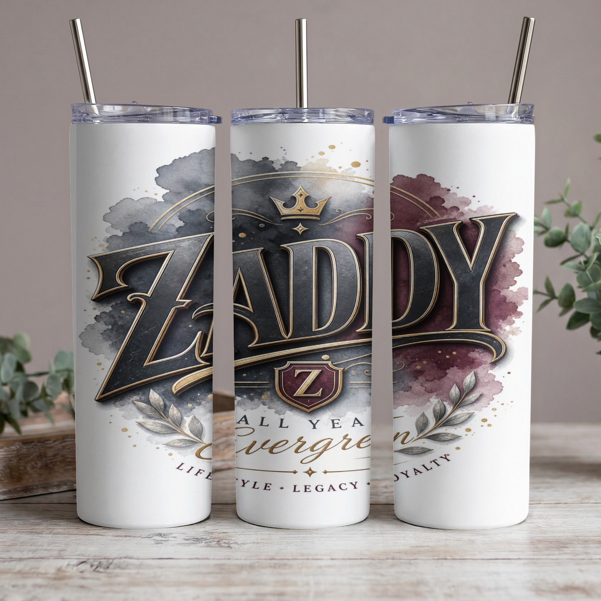 White tumblers with "Zaddy" and "All Year Evergreen" text, gold accents.