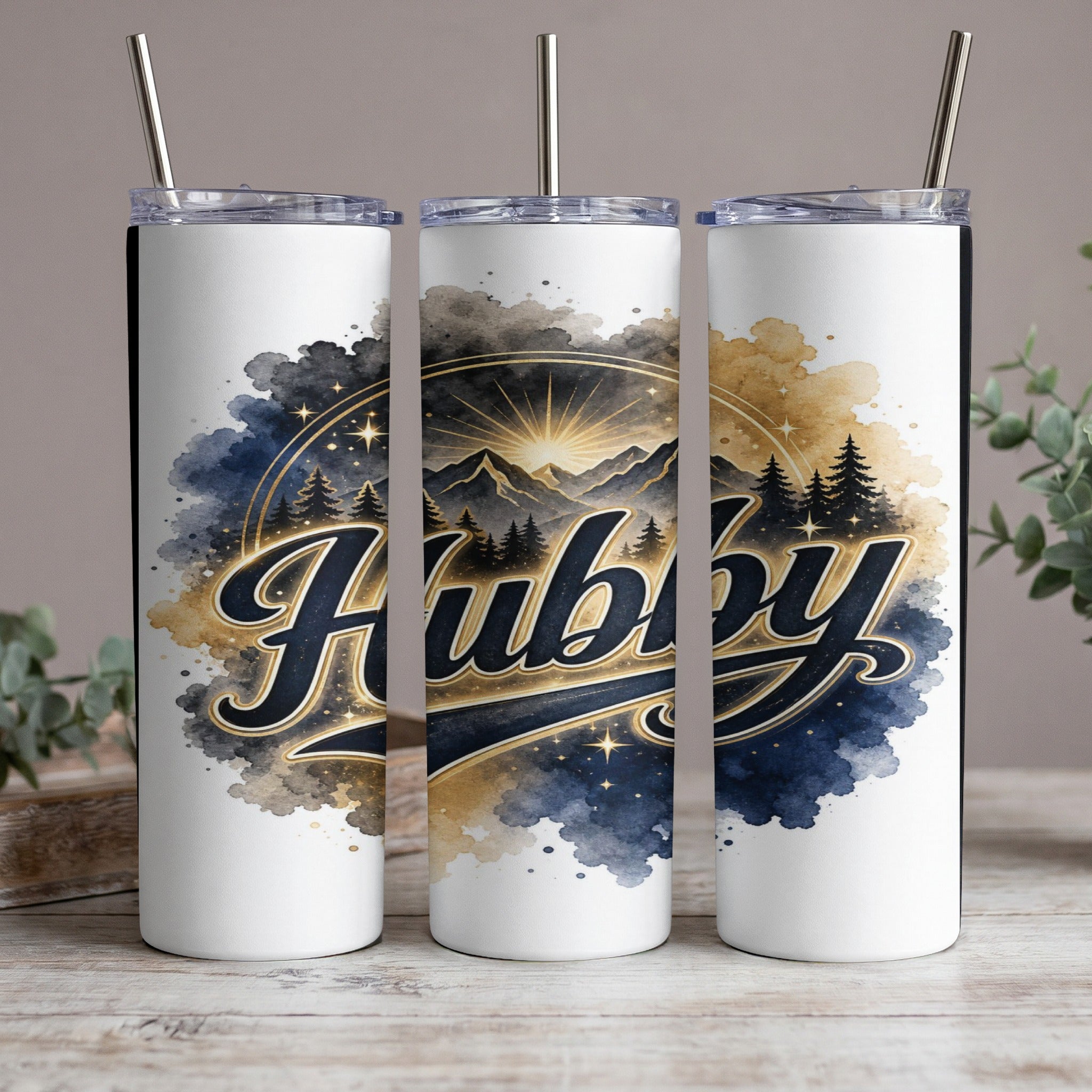 White tumbler with "Hubby" text, mountain landscape, and starry sky design.