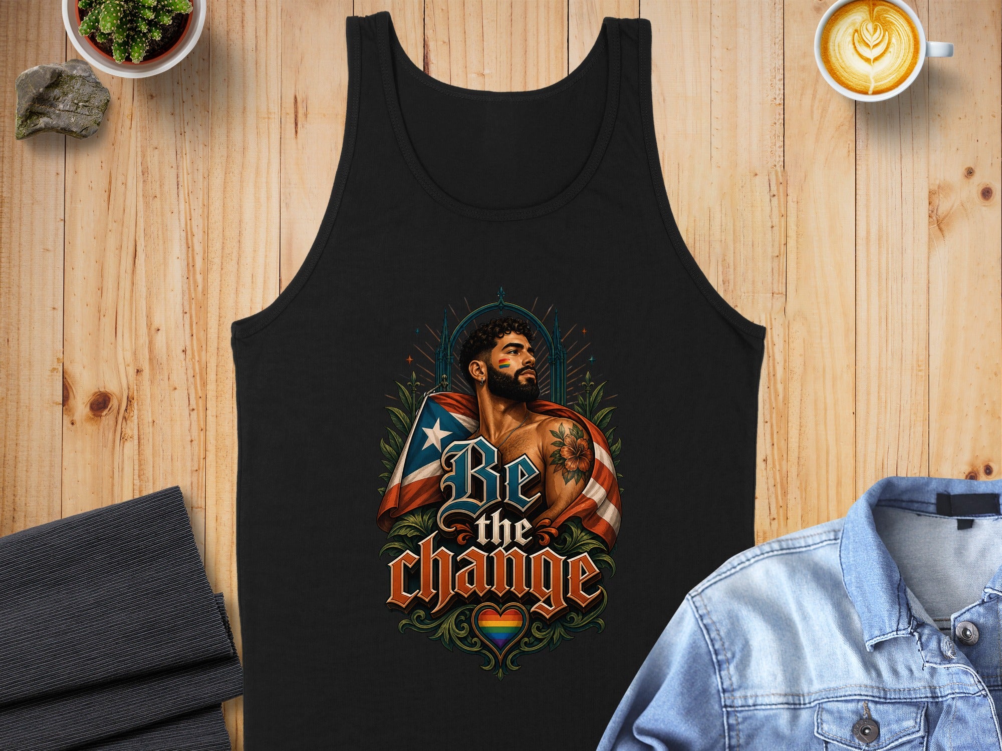 Black tank top with "Be The Change" slogan and patriotic LGBTQ+ pride artwork.