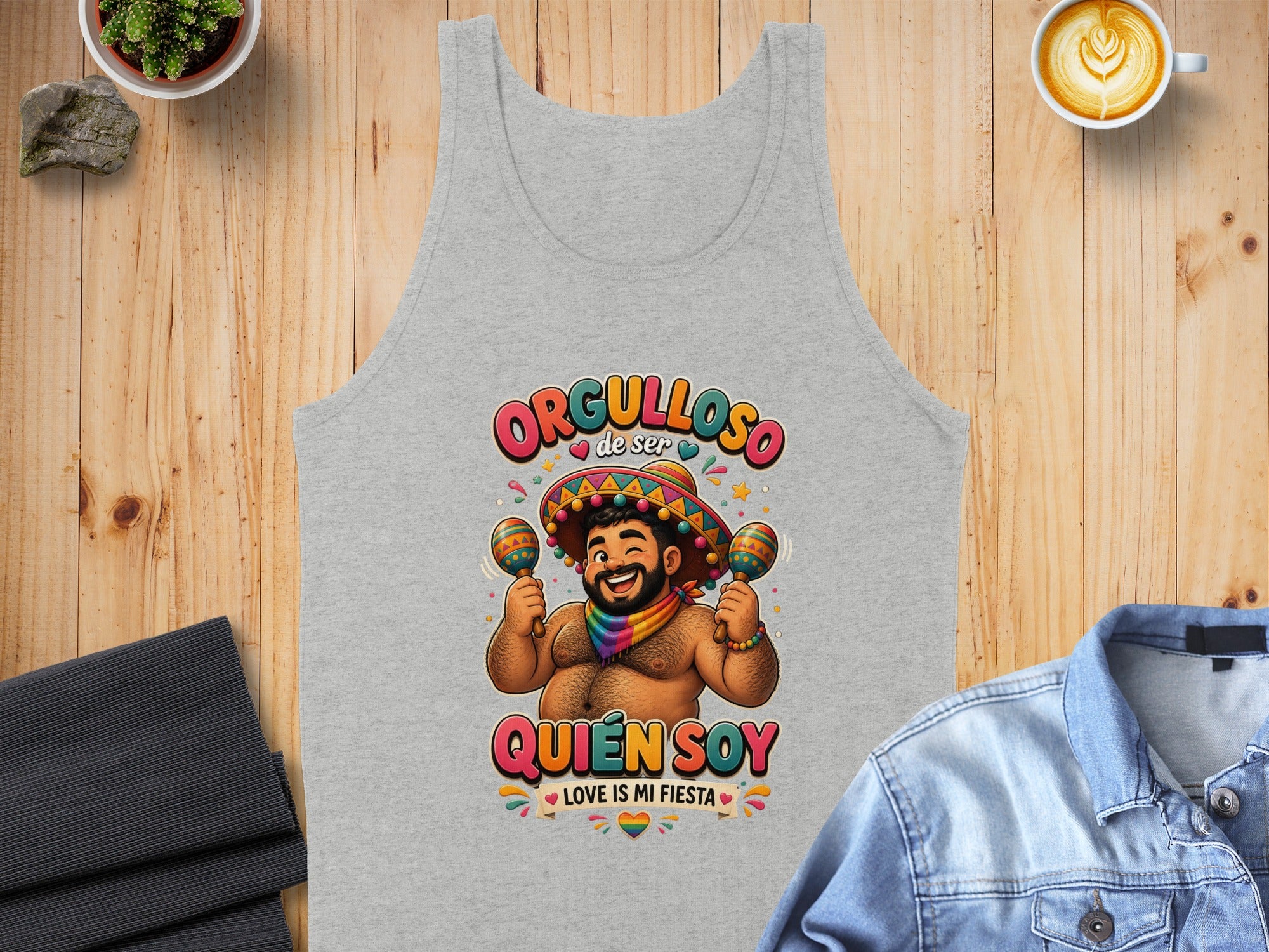 Tank top with "ORGULLOSO de ser QUIÉN SOY" and a maraca-playing figure.