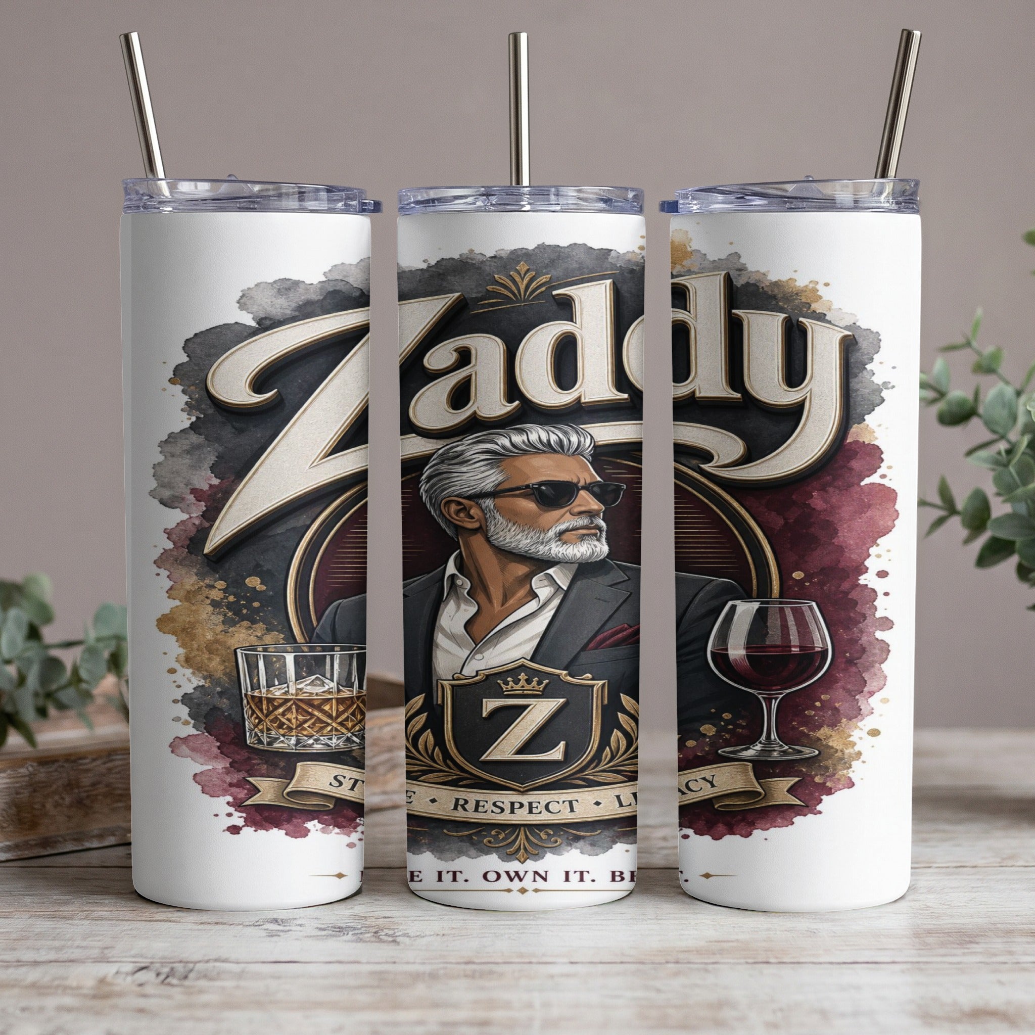 Tumbler with a stylized "Zaddy" design, a man in sunglasses, whiskey, and wine.