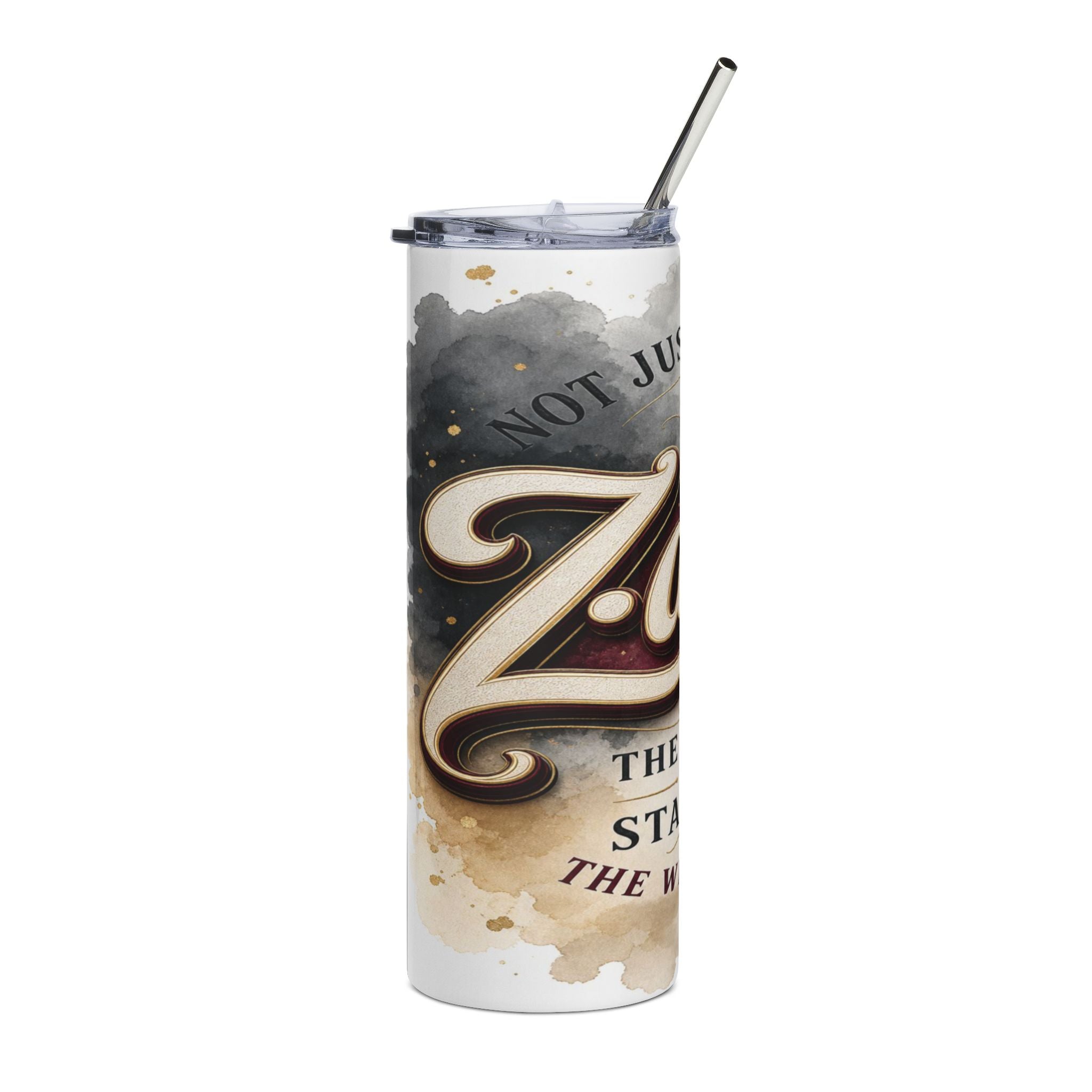 Tumbler with a straw, featuring watercolor stains and the text "NOT JU" and "THE STA THE W".