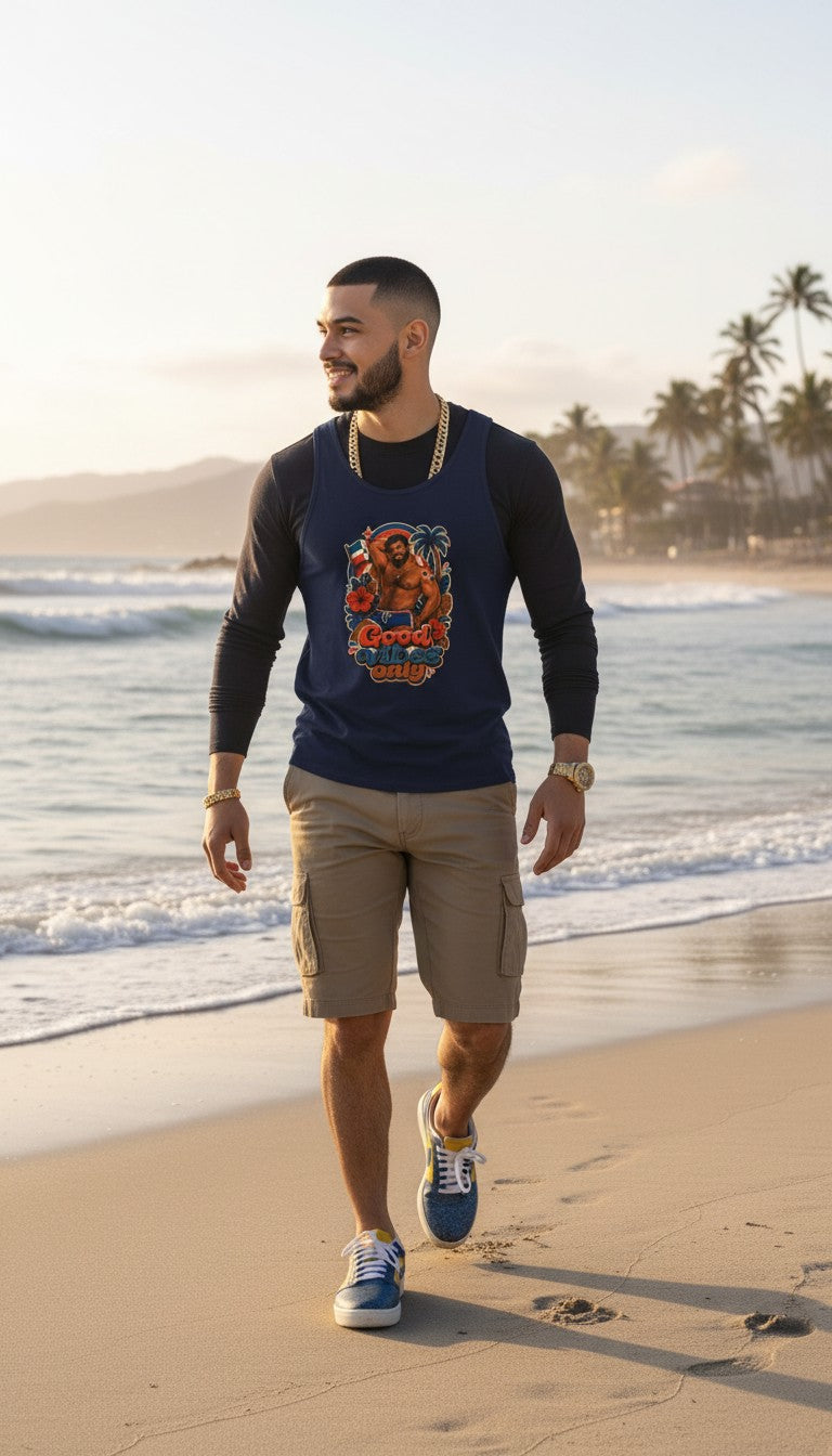 Oso Caribeño navy blue cotton t-shirt with Good Vibes Only island graphic worn by a man on a sunny beach.