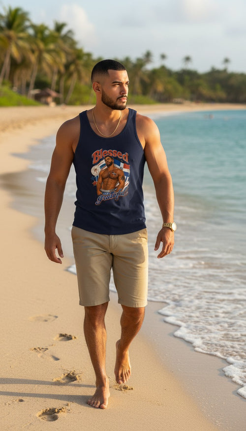 Oso Caribeño navy tank top featuring a Dominican Republic Blessed & Grateful graphic worn by a man on a tropical beach