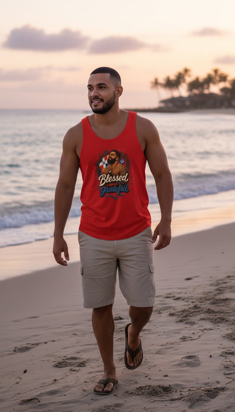 Oso Caribeño red tank top with Blessed and Grateful Dominican heritage graphic worn by a man on a beach at sunset.