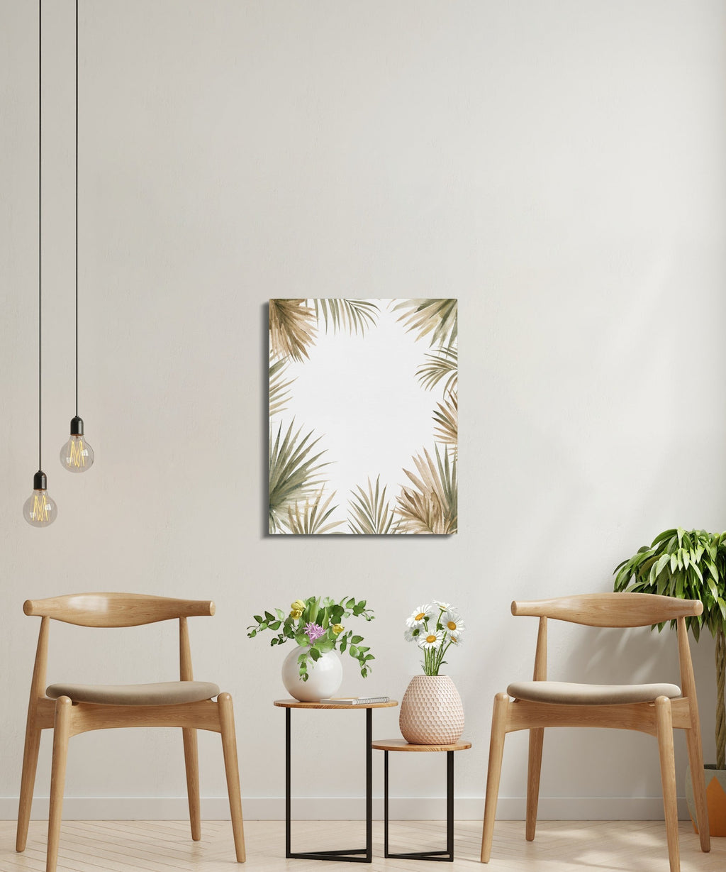 Oso Caribeño watercolor palm frond canvas art hanging on a neutral wall above two wooden chairs and side tables.